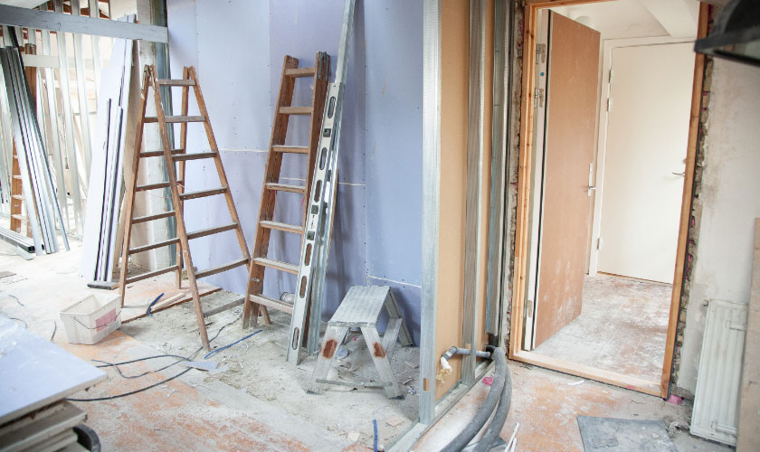 Room in construction with ladders